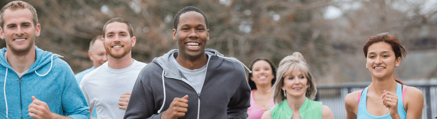 Group of people jogging outdoors, promoting pure herbal supplements for wellness and active lifestyles