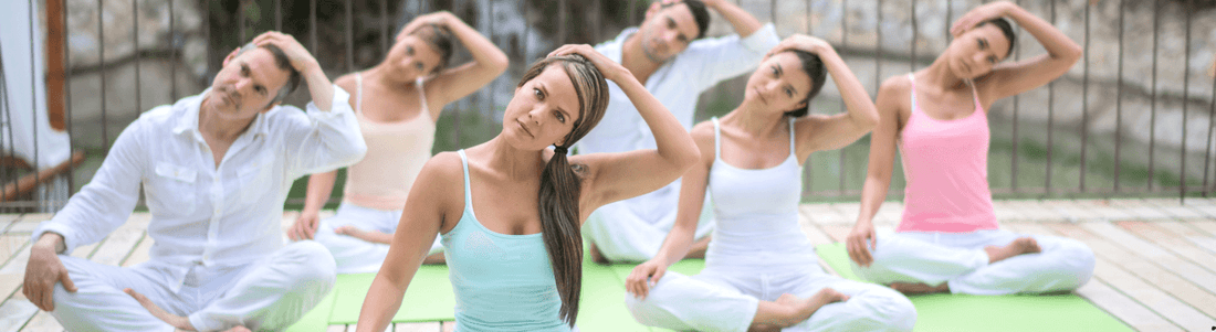 Group practicing yoga for balance and wellness products, promoting relaxation and overall well-being