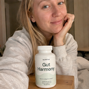 A 3x3 collage of women and men holding white supplement bottles labeled 'Gut Harmony' in various real-world settings, including beach scenes, home interiors, and outdoor locations.