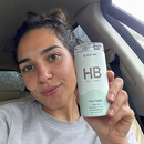 A 3x3 collage of people holding and drinking from white supplement bottles labeled HB and LOFO. The group includes men and women in various real-world settings such as outdoors, at the beach, in a kitchen, and in a car.